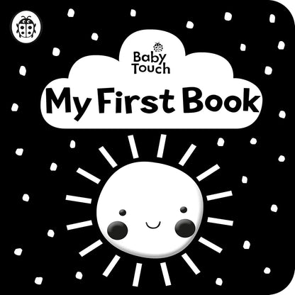 Baby Touch 'My First Book' cover with a smiling moon on a black background