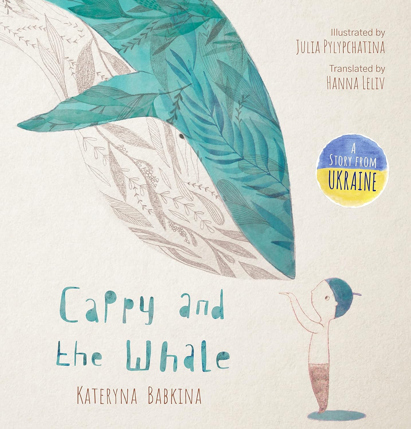 Book cover of 'Cappy and the Whale' with illustrations of a whale and a child, and text indicating Ukrainian origin.
